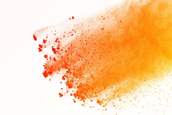 Abstract of orange powder splatted isolate on white background. Colored powder explosion.