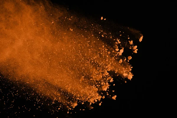 Zmrazit Pohyb Zbarveného Prášku Výbuchů Izolované Černém Pozadí Orange Prach — Stock fotografie
