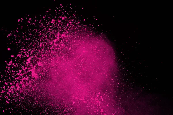 Siyah arka plan üzerine soyut pembe toz patlama. renkli toz splatted abstract, pembe toz patlayan hareket dondurmak.