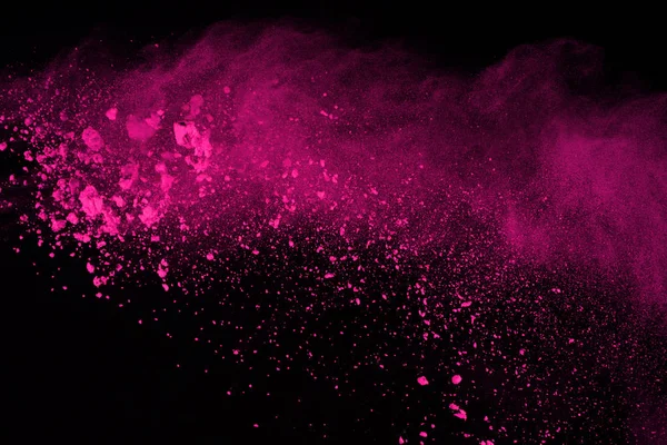 Siyah arka plan üzerine soyut pembe toz patlama. renkli toz splatted abstract, pembe toz patlayan hareket dondurmak.