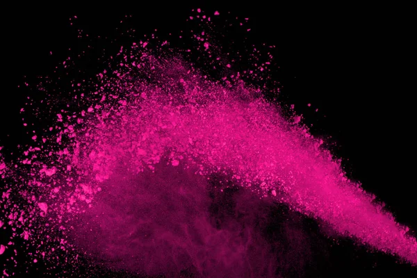 Siyah arka plan üzerine soyut pembe toz patlama. renkli toz splatted abstract, pembe toz patlayan hareket dondurmak.