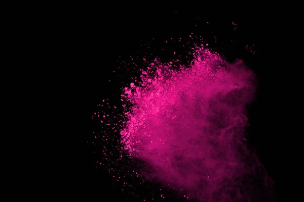 Siyah arka plan üzerine soyut pembe toz patlama. renkli toz splatted abstract, pembe toz patlayan hareket dondurmak.