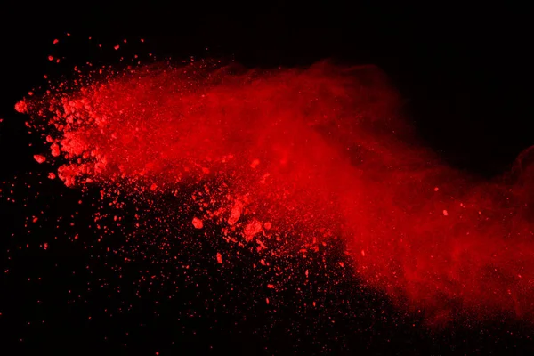 Résumé Explosion Poudre Rouge Sur Fond Noir Isolat Éclaboussé Poudre — Photo