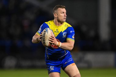 Warrington Wolves 'tan Josh Drinkwater, 1 Mart 202' de Warrington, İngiltere 'de oynanan Betfred Süper Lig 3. tur karşılaşmasında Warrington Wolves Castleford Tigers' a karşı oynuyor.