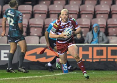 Wigan Warriors 'dan Liam Marshall, 1 Mart 202' de Wigan, İngiltere 'deki Wigan Stadyumu' nda oynanan Betfred Süper Lig 3. tur karşılaşmasında 4-0 Wigan 'a koşuyor.