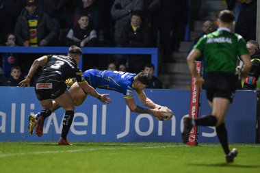 Warrington Wolves 'tan Matty Ashton, 1 Mart 202' de İngiltere 'nin Warrington kentinde oynanan Betfred Süper Lig 3. tur karşılaşmasında Warrington Wolves Castleford Tigers' a karşı oynuyor.