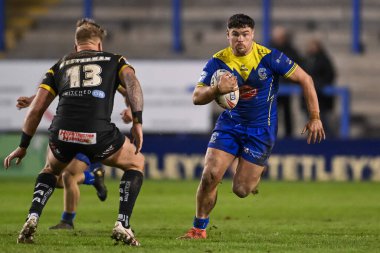 Warrington Wolves takımından Joe Philbin, 1 Mart 202 'de Warrington, İngiltere' de oynanan Warrington Wolves Castleford Tigers maçında ilk raundu kazandı.