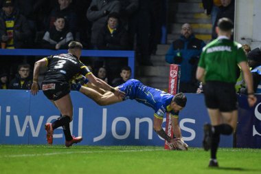 Warrington Wolves 'tan Matty Ashton, 1 Mart 202' de İngiltere 'nin Warrington kentinde oynanan Betfred Süper Lig 3. tur karşılaşmasında Warrington Wolves Castleford Tigers' a karşı oynuyor.