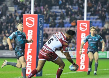 Wigan Warriors 'dan Bevan French, 1 Mart 202' de DW Stadyumu 'nda oynanan Betfred Süper Lig 3. tur karşılaşmasında Wigan Warriors' a karşı Huddersfield Giants 'ı 10-0 yenmek için koşuyor.