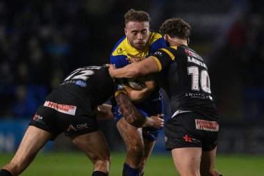 Warrington Wolves 'dan James Harrison Castleford Tigers' dan Alex Mellor ve Castleford Tigers 'dan George Lawler, Warrington Wolves Castleford Tigers' a karşı oynadıkları 3. tur karşılaşmasında Halliwell Jones Stadyumu, Warrington, Uni