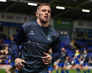 Warrington Wolves takımından Matt Dufty, Betfred Süper Lig 3. tur karşılaşmasında ısınma turunda Warrington Wolves Castleford Tigers 'a karşı Halliwell Jones Stadyumu, Warrington, 1 Mart 202