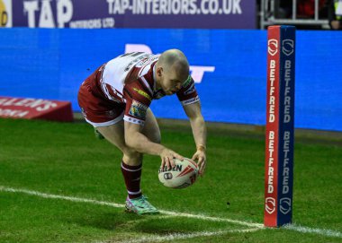 Wigan Warriors 'dan Liam Marshall, 1 Mart 202' de Wigan, İngiltere 'deki Wigan Stadyumu' nda oynanan Betfred Süper Lig 3. Raundda Wigan Warriors 'un Huddersfield Giants' a karşı oynadığı maçta 22-10 Wigan 'a çıkmaya çalışıyor.