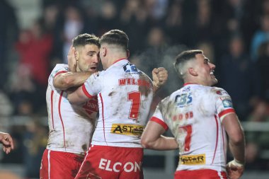 St. Helens 'ten Tommy Makinson, 1 Mart 202' de St Helens - Leigh Leopards maçında oynanan Betfred Süper Lig karşılaşmasında 8-4 'lük galibiyetini kutluyor.