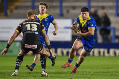 Warrington Wolves takımından Joe Philbin, 1 Mart 202 'de Warrington, İngiltere' de oynanan Warrington Wolves Castleford Tigers maçında ilk raundu kazandı.