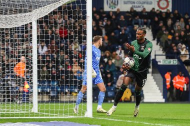 Coventry City 'den Hacı Wright, 1 Mart 202' de İngiltere 'nin başkenti West Bromwich Albion' a karşı Coventry City 'de oynanan Sky Bet Şampiyonası maçında 2-1' lik galibiyetini kutluyor.