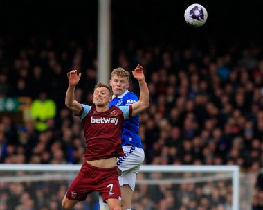 Jarrad Branthwaite of Everton wins a header against James Ward-Prowse of West Ham United during the Premier League match Everton vs West Ham United at Goodison Park, Liverpool, United Kingdom, 2nd March 202 clipart