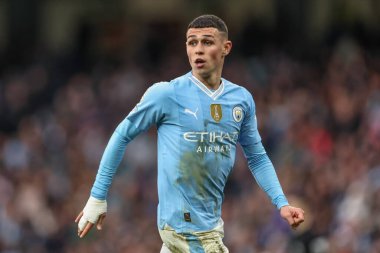 Manchester City - Manchester United Premier League maçı sırasında Manchester City maçında Phil Foden Etihad Stadyumu, Manchester, İngiltere, 3 Mart 202