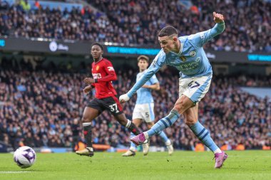 Phil Foden of Manchester City scores to make it 2-1 during the Premier League match Manchester City vs Manchester United at Etihad Stadium, Manchester, United Kingdom, 3rd March 202 clipart