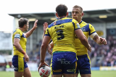 Warrington Wolves 'dan Toby King, 6 Eylül 2025' te İngiltere 'nin Warrington kentinde oynanan Betfred Süper Lig 25. Maçı' nda Warrington Wolves - Leigh Leopards maçını kutluyor.