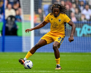 AFC Wimbledon takımından Nathan Asiimwe 6 Eylül 2025 'te İngiltere' nin Bolton Stadyumu 'nda Bolton Wanderers ile AFC Wimbledon maçında karşılaşacak.