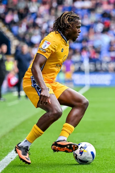 AFC Wimbledon takımından Nathan Asiimwe 6 Eylül 2025 'te İngiltere' nin Bolton Stadyumu 'nda Bolton Wanderers ile AFC Wimbledon maçında karşılaşacak.