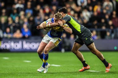 Leeds Rhinos takımından James McDonnell, Betfred Süper Lig 26. Raundda Leeds Gergedan 'a karşı Catalans Dragons maçında Katalan Ejderhaları' ndan Reimis Smith tarafından 11 Eylül 2025 'te Headingley Stadyumu' nda yenildi.