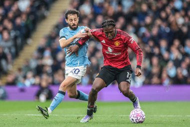 Manchester City 'den Bernardo Silva ve Manchester United' dan Patrick Dorgu Premier Lig karşılaşmasında Manchester City ile Manchester United Etihad Stadyumu 'nda 14 Eylül 2025 tarihinde karşı karşıya geldiler.