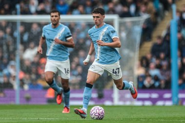 Manchester City 'nin Manchester United' a karşı 14 Eylül 2025 'te Etihad Stadyumu' nda oynanan Premier League maçı sırasında Manchester City 'den Phil Foden