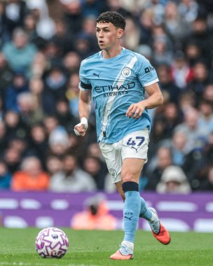 Manchester City 'nin Manchester United' a karşı 14 Eylül 2025 'te Etihad Stadyumu' nda oynanan Premier League maçı sırasında Manchester City 'den Phil Foden