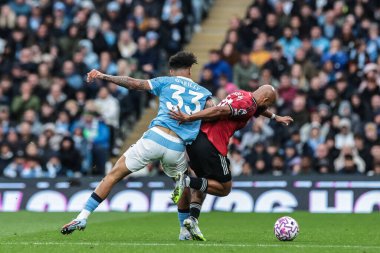 Manchester City 'den Nico O' Reilly ve Manchester United 'dan Bryan Mbeumo Premier League karşılaşmasında Manchester City ile Manchester United Etihad Stadyumu' nda 14 Eylül 2025 'de karşı karşıya geldiler.