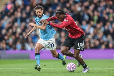 Manchester City 'den Bernardo Silva ve Manchester United' dan Patrick Dorgu Premier Lig karşılaşmasında Manchester City ile Manchester United Etihad Stadyumu 'nda 14 Eylül 2025 tarihinde karşı karşıya geldiler.