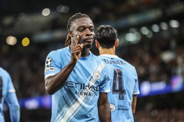 Manchester City 'den Jeremy Doku, UEFA Şampiyonlar Ligi 25 / 26 Faz MD1 Manchester City' nin Napoli Ligi 'ne karşı 18 Eylül 2025' te Manchester, İngiltere 'deki The City of Manchester Stadyumu' nda 2-0 'lık galibiyet golünü kutluyor. 