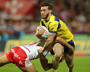 Tyrone May of Hull KR tackles Adam Holroyd of Warrington Wolves during the Betfred Super League round 27 match Hull KR vs Warrington Wolves at Sewell Group Craven Park, Kingston upon Hull, United Kingdom, 18th September 2025 