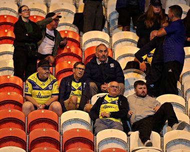 Warrington fans discuss during the Betfred Super League round 27 match Hull KR vs Warrington Wolves at Sewell Group Craven Park, Kingston upon Hull, United Kingdom, 18th September 2025 