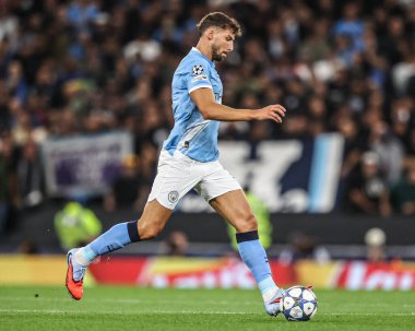 Manchester City 'den Ruben Dias topu UEFA Şampiyonlar Ligi' nde 25 / 26 Faz MD1 Manchester City Napoli Ligi 'ne karşı Manchester Stadyumu, Manchester, İngiltere' de 18 Eylül 2025 'de atıyor. 