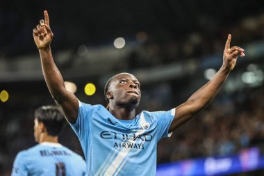 Manchester City 'den Jeremy Doku, UEFA Şampiyonlar Ligi 25 / 26 Faz MD1 Manchester City' nin Napoli Ligi 'ne karşı 18 Eylül 2025' te Manchester, İngiltere 'deki The City of Manchester Stadyumu' nda 2-0 'lık galibiyet golünü kutluyor. 