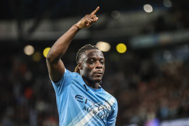 Manchester City 'den Jeremy Doku, UEFA Şampiyonlar Ligi 25 / 26 Faz MD1 Manchester City' nin Napoli Ligi 'ne karşı 18 Eylül 2025' te Manchester, İngiltere 'deki The City of Manchester Stadyumu' nda 2-0 'lık galibiyet golünü kutluyor. 