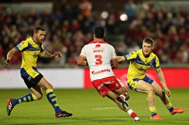 Peta Hiku of Hull KR runs at Marc Sneyd of Warrington Wolves and Jake Thewlis of Warrington Wolves during the Betfred Super League round 27 match Hull KR vs Warrington Wolves at Sewell Group Craven Park, Kingston upon Hull, United Kingdom 