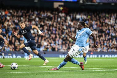 Manchester City 'den Jeremy Doku, UEFA Şampiyonlar Ligi 25 / 26 Faz MD1 Manchester City, Manchester Stadyumu' nda Napoli Ligi 'ne karşı 18 Eylül 2025' de oynanan maçta 2-0 berabere kaldı. 