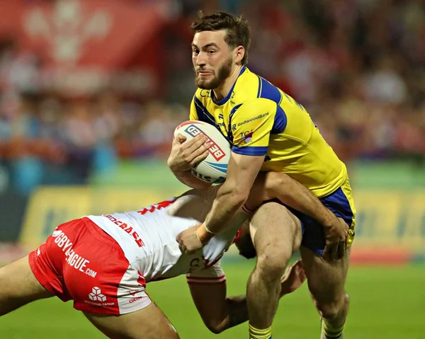 Tyrone May of Hull KR tackles Adam Holroyd of Warrington Wolves during the Betfred Super League round 27 match Hull KR vs Warrington Wolves at Sewell Group Craven Park, Kingston upon Hull, United Kingdom, 18th September 2025 