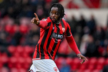 Admiral Muskwe of Morecambe points during the Enterprise National League match Morecambe vs Wealdstone  at Mazuma Stadium, Morecambe, United Kingdom, 20th September 2025 
