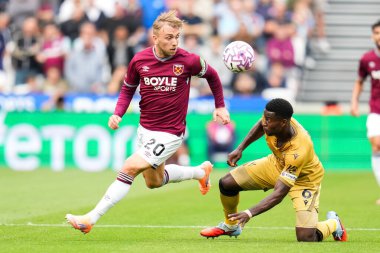 Crystal Palace 'dan Marc Guehi ve West Ham United Premier League karşılaşmasında Jarrod Bowen Londra Stadyumu' nda 20 Eylül 2025 tarihinde karşı karşıya geldiler. 