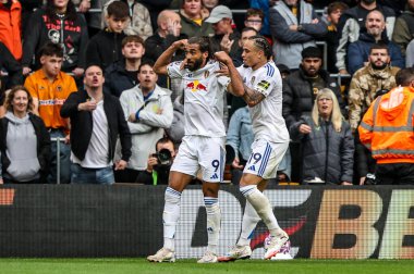 Leeds United takımından Dominic Calvert-Lewin, 20 Eylül 2025 'te İngiltere' nin Molineux kentinde oynanan Premier League maçında Wolverhampton Wanderers - Leeds United maçında 1-1 kazanma golünü kutluyor.