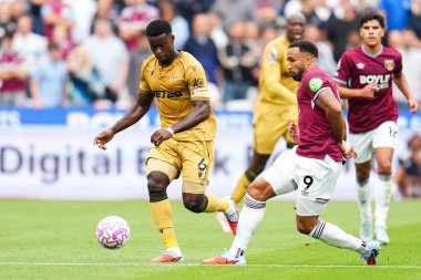 West Ham United 'dan Callum Wilson ve Crystal Palace' dan Marc Guehi Premier League maçı sırasında Londra Stadyumu 'nda West Ham United, Crystal Palace' a karşı, 20 Eylül 2025 