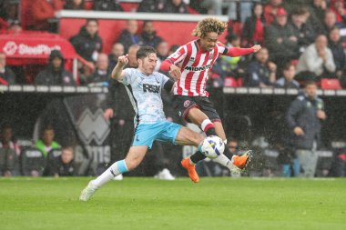 Sheffield United takımından Tahith Chong, Sheffield United 'ın Charlton Athletic' e karşı oynadığı 20 Eylül 2025 'te, İngiltere' nin başkenti Sheffield 'da oynanan maçta maç yapıyor. 