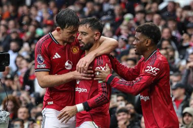 Manchester United takımından Bruno Fernandes 20 Eylül 2025 'te Old Trafford, Manchester, İngiltere' de oynanan Premier League karşılaşmasında 1-0 'lık galibiyet golünü kutluyor. 
