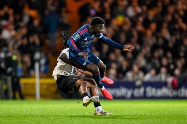 Arsenal 'den Bukayo Saka, 24 Eylül 2025' te Vale Park, Burslem, Birleşik Krallık 'ta oynanan Carabao Kupası 3. tur karşılaşmasında Port Vale ve Arsenal maçında Port Vale Headley tarafından altüst edildi.