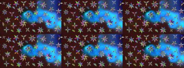 Kumaş desenli papatya çiçeği detayı. Kahverengi ve mavi renkte çiçekler.