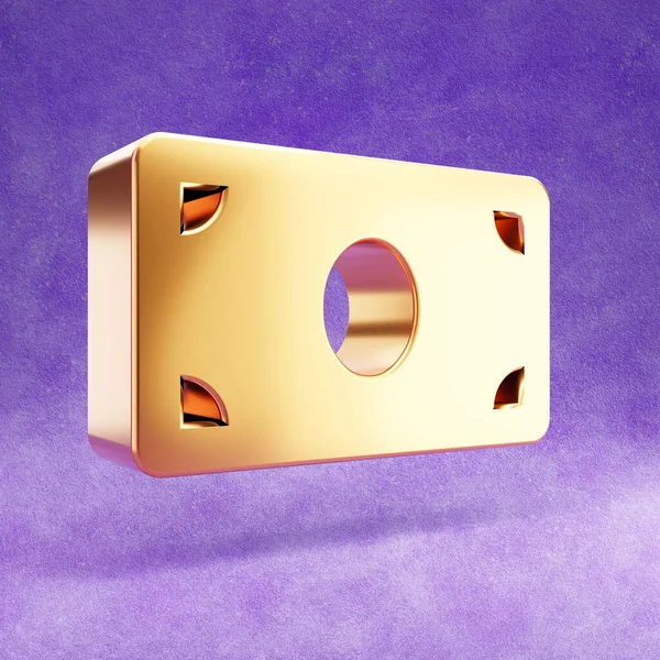 Icône de billet. Or brillant symbole billet d'argent isolé sur fond de velours violet. — Photo