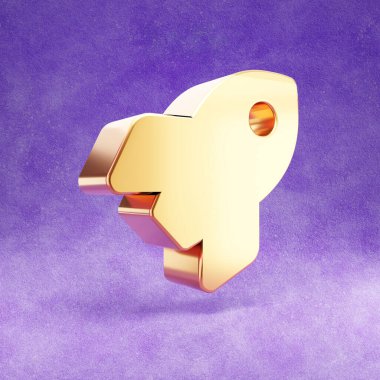 Roket ikonu. Mor kadife arka planda izole edilmiş altın renkli roket sembolü.